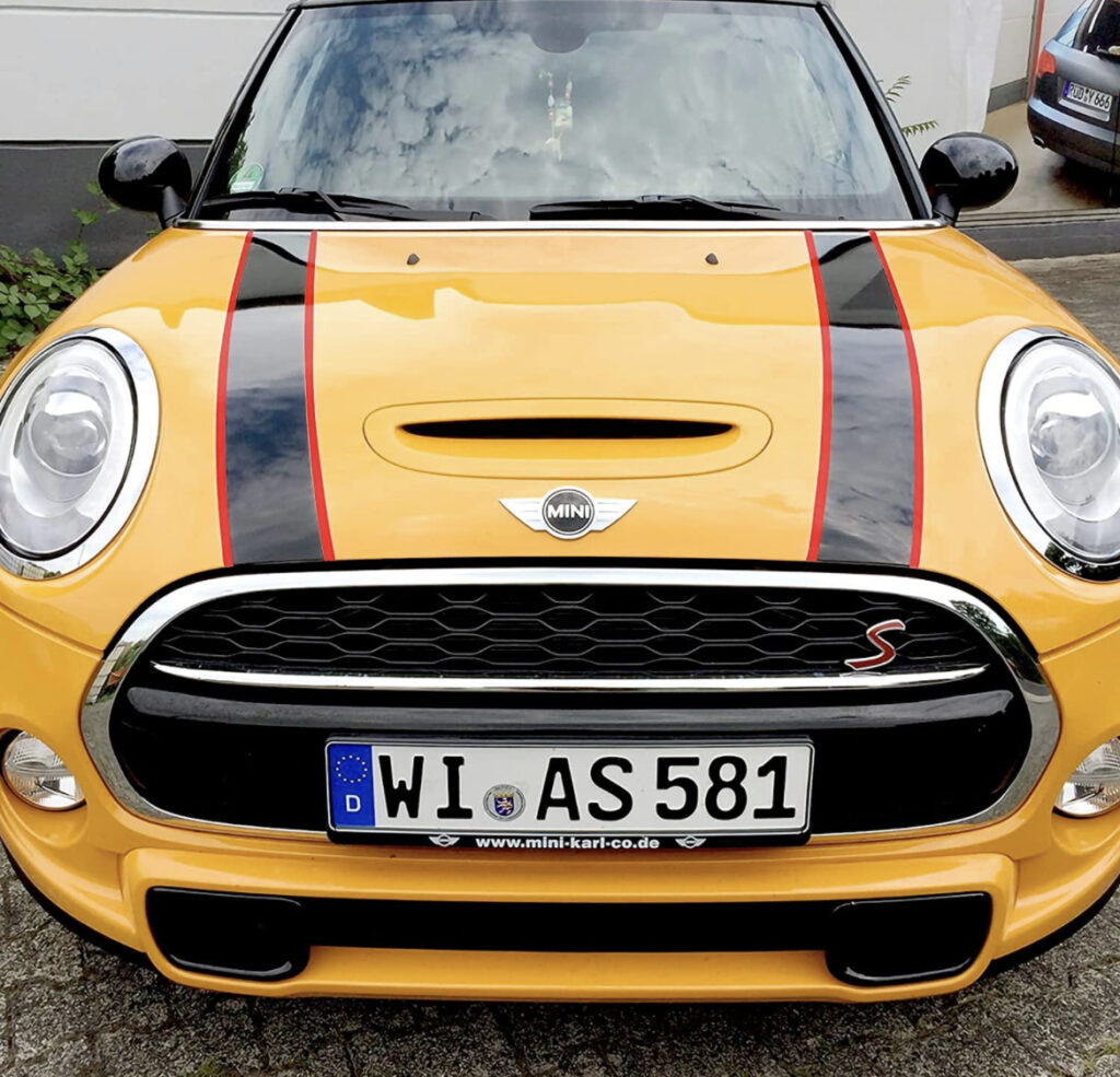 Gold Mini Cooper with black and red stripes
