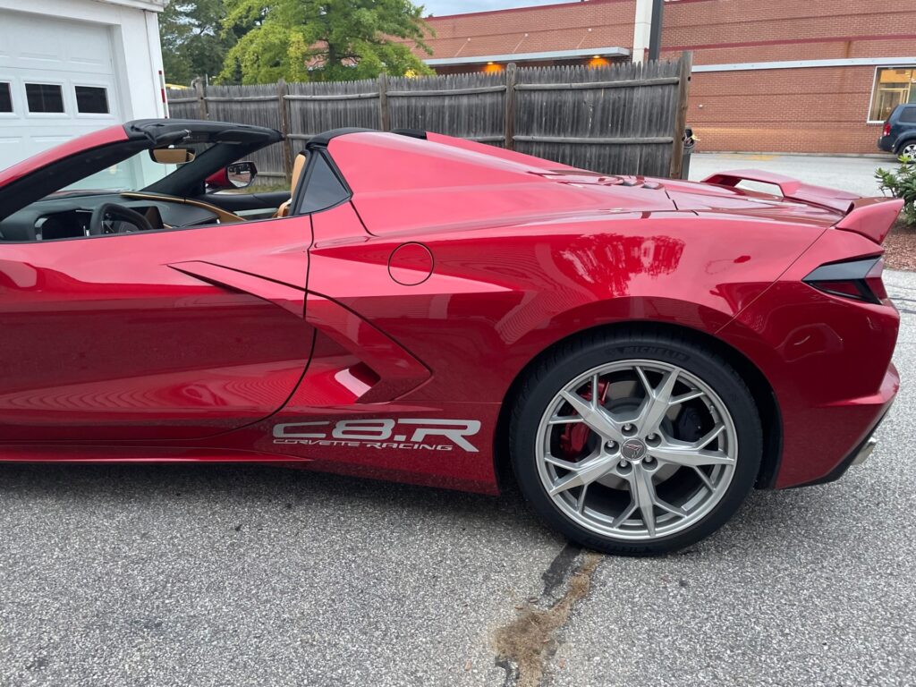 Red Corvette C8 with White C8.R Vinyl Lettering Decal, showcasing premium mobile installation of custom car graphics, PPF, and pinstriping.
