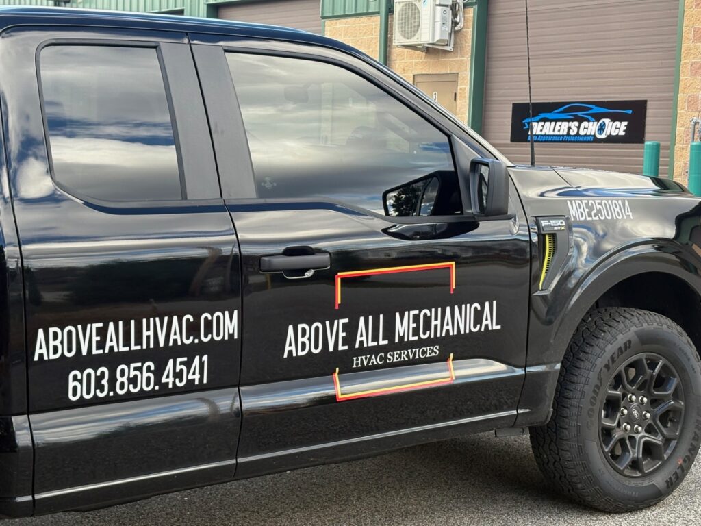 Black truck with custom commercial vehicle branded decal