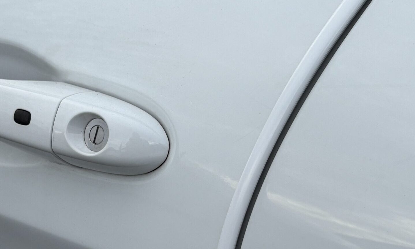 White car with door edge guards installed
